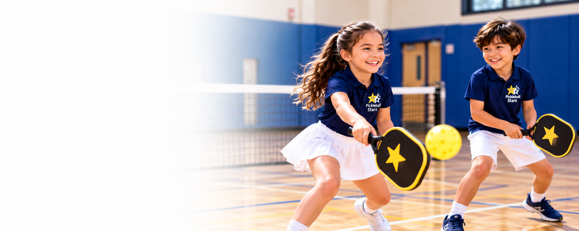 Children playing pickleball with Pickleball Stars